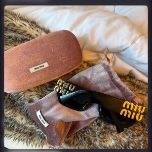 Miu Miu Black Sunglasses with Gold Accents and Pink Case